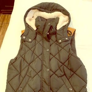 Puffy vest with Sherpa hood lining